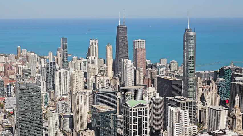 Stunning aerial view of Chicago skyline, iconic skyscrapers overlooking Lake Michigan, vibrant cityscape and horizon