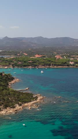 The sea of ​​Sardinia, Capo Coda Cavallo. Punta EST. Italy.
Aerial shot with the drone of the exclusive coast of Sardinia. Italy.
