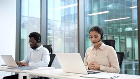 Team of Customer Service Representatives manager Working at Computers with Headsets Corporate operators technical support specialist consulting client call center Group friendly smiling Employee agent - Powered by Shutterstock - Get 15% off with code: PIKWIZARD15