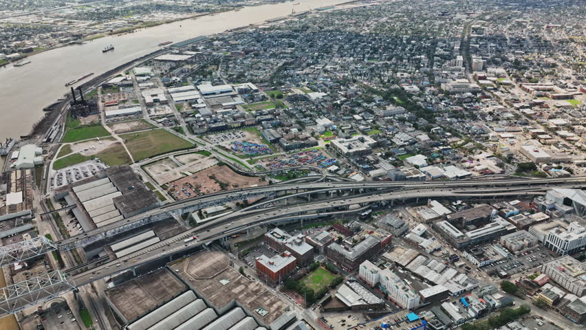 An aerial view of New Orleans with the Mississippi River flowing through the city