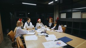 Join us for a festive and lively team meeting filled with creative women, celebrating Christmas at work while brainstorming ambitious ideas and strategies for our business success - Powered by Shutterstock - Get 15% off with code: PIKWIZARD15