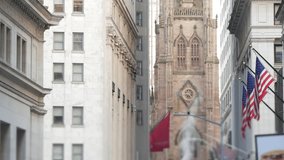 New York City United States. Lower Manhattan Downtown Financial District urban architecture. American Flag, Trinity Church. Wall street Stock Exchange building, USA Stock Market. Hot steam smoke stack - Powered by Shutterstock - Get 15% off with code: PIKWIZARD15