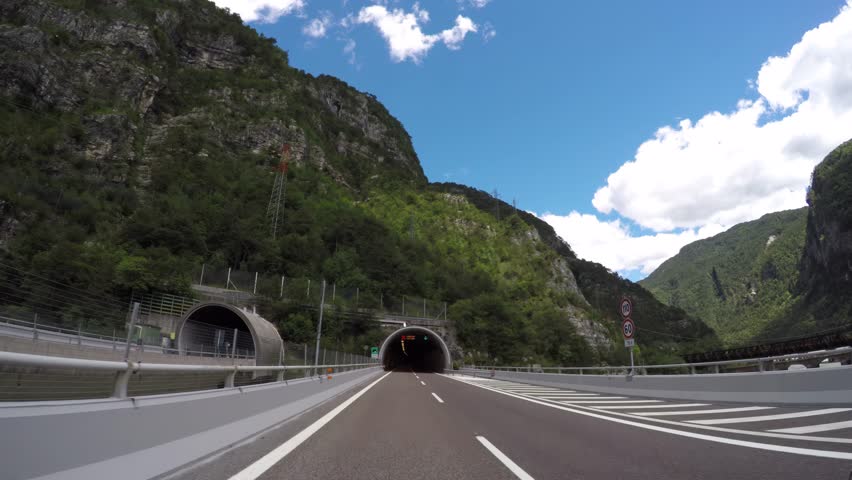 Traveling through a long tunnel in the Alps