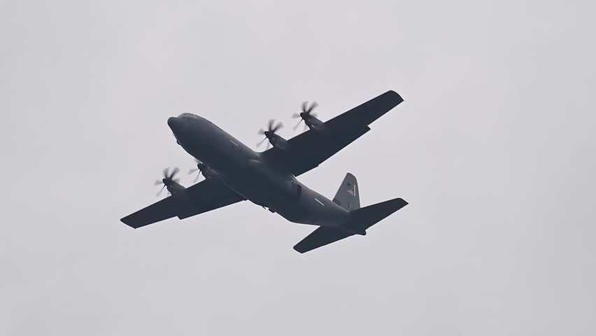 The 13th Special Mission Brigade jump from a U.S. Air Force C-130J Super Hercules assigned to the 36th Airlift Squadron, Yokota Air Base, Japan.