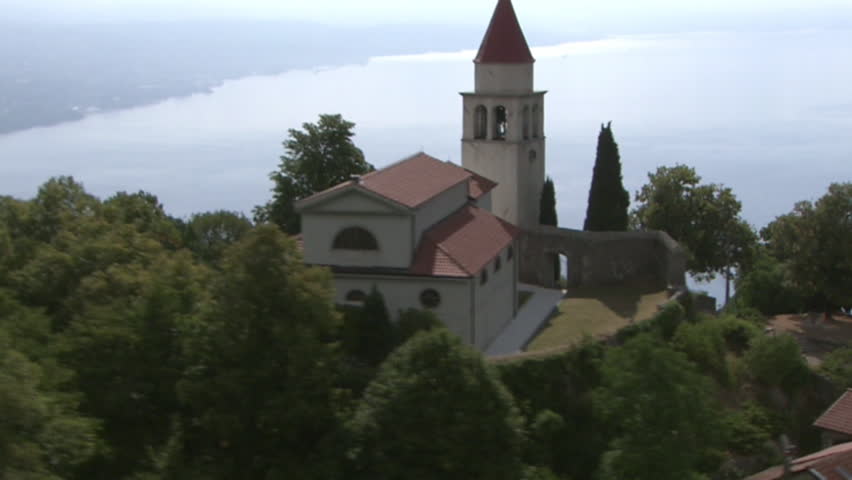 Aerial shot of a church above the Kvarner Bay, Veprinac, Croatia