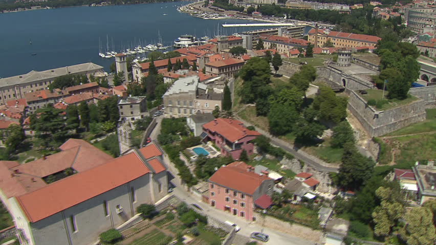 City of Pula with the Castel and the Arena dominating. Aerial helicopter shot.