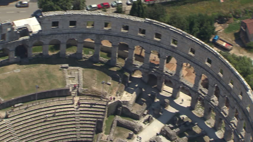 A very close circling view of the Arena at City of Pula. Aerial shot.
