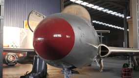 Airplane In Hangar Undergoing Repairs - Powered by Shutterstock - Get 15% off with code: PIKWIZARD15