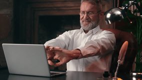 Caucasian old man businessman business male elderly stretching hands fingers start work laptop entrepreneur finance technology computer typing office internet online mature worker employee desktop pc - Powered by Shutterstock - Get 15% off with code: PIKWIZARD15