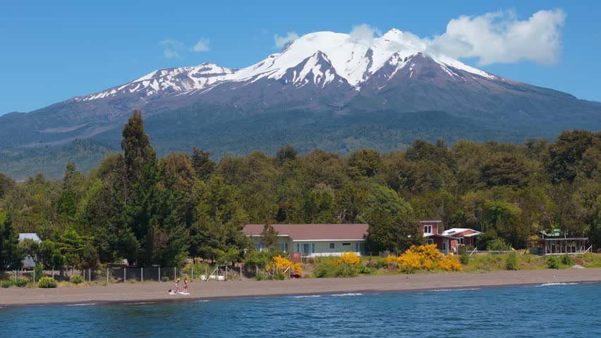 Llanquihue Lake and Calbuco Volcano in a sunny day