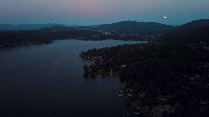Aerial landscape of Lake Washington forest and mountains at sunset Bellevue suburb of Seattle WA USA