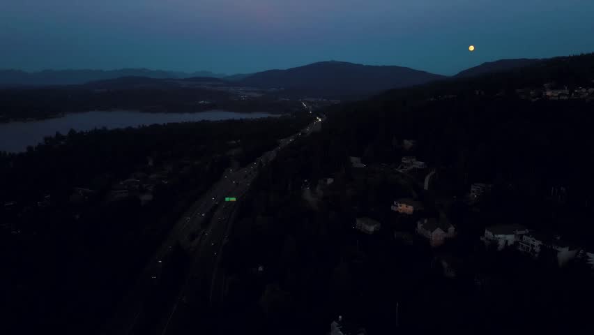 Aerial landscape of Lake Washington forest and mountains at sunset Bellevue suburb of Seattle WA USA