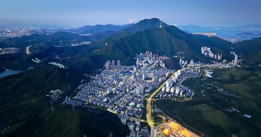 Modern city residential area buildings and mountain landscape in Shenzhen, China