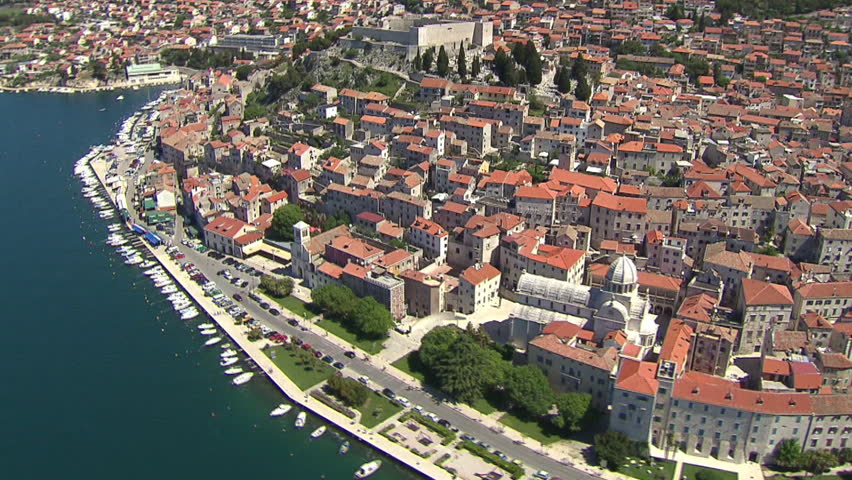 Spinning around the cathedral of Sibenik. Aerial helicopter shot.