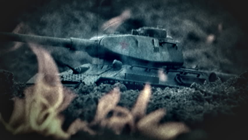 Soviet IS Tank on a battlefield WW2 reconstruction. Surrounded by flames and destruction. Horrors of war.