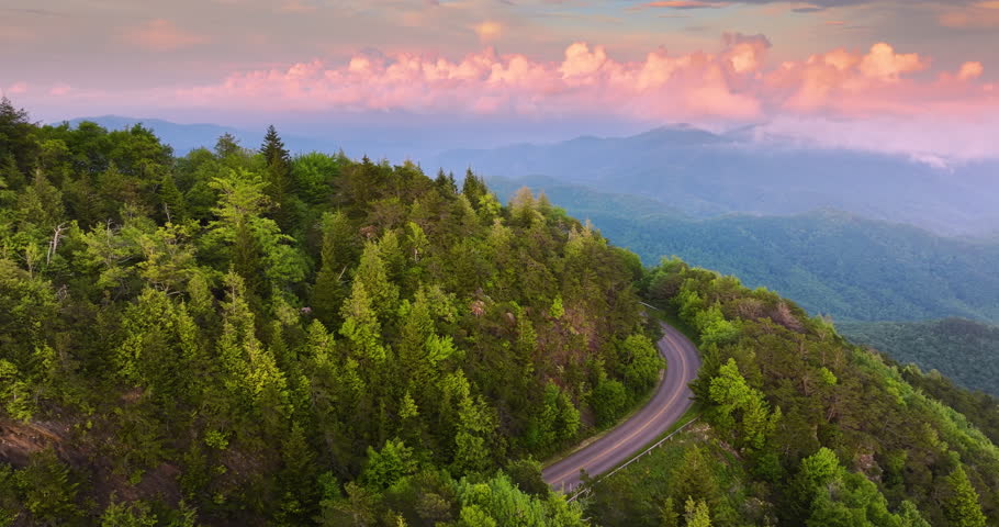 Evening mountain landscape of forest road in North Carolina Appalachians, USA. Blue Ridge Parkway American highway in summer season