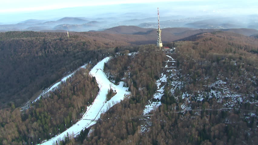 Radio and TV tower on the top of the peak Sljeme. Aerial helicopter shot.