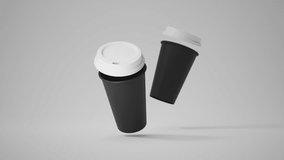 Two Minimalist Black Blank Paper Coffee Cup floating above white background. Takeaway paper coffee cups flying. Loop, 4k, 3d render - Powered by Shutterstock - Get 15% off with code: PIKWIZARD15