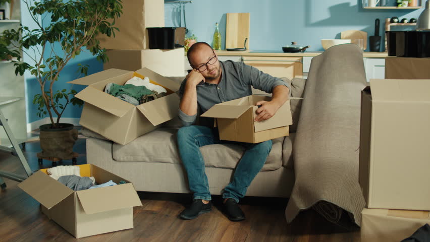 Calling a Moving Service for Assistance with Packing, Transporting, and Organizing Belongings. Convenience and Efficiency of Professional Movers for Stress-Free Relocation and Smooth Transition