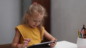 A little girl addicted to gadgets. Mom takes away the tablet. The problem with addiction and excessive use of the Internet, dependence on social networks. - Powered by Shutterstock - Get 15% off with code: PIKWIZARD15