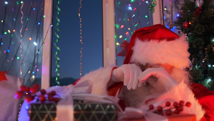 Santa wipes away tears, creating a hopeful holiday scene.