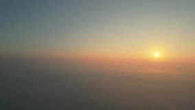 Sunrise breaking through morning fog over a vast landscape creating a tranquil, atmospheric scene - Powered by Shutterstock - Get 15% off with code: PIKWIZARD15