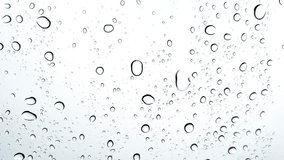 A close-up view of a glass surface with water droplets shimmering in soft light, evoking calmness and purity. - Powered by Shutterstock - Get 15% off with code: PIKWIZARD15