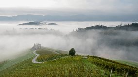 Time-lapse video of morning mists creeping over the picturesque, autumn-covered hills and the famous heart-shaped road near Maribor, close to the Austrian border in Slovenia. - Powered by Shutterstock - Get 15% off with code: PIKWIZARD15