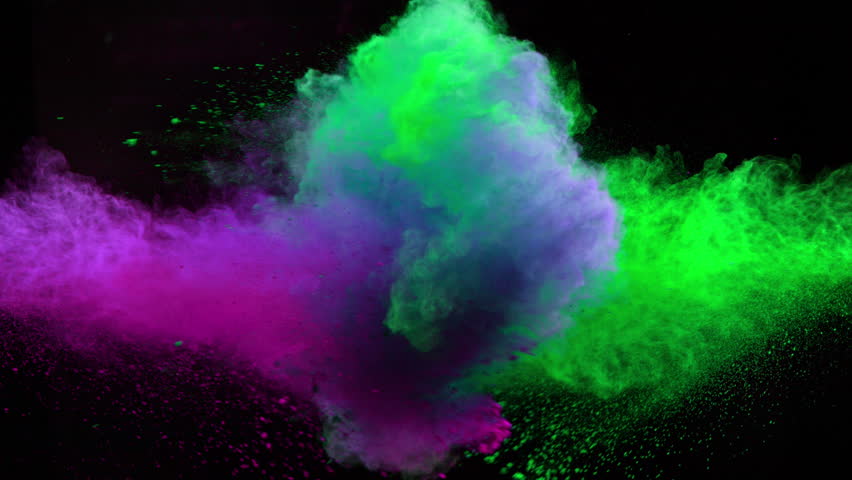 Super Slow Motion Shot of Blowing Color Powders Isolated on Black Background.