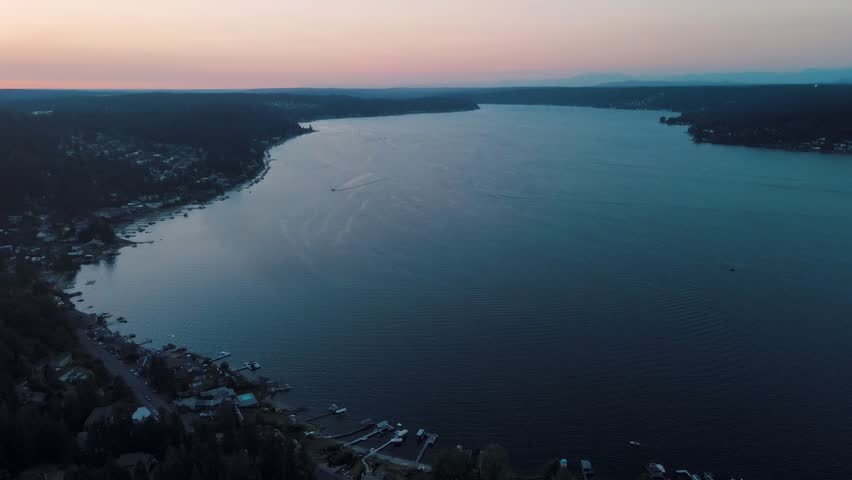 Aerial landscape of Lake Washington forest and mountains at sunset Bellevue suburb of Seattle WA USA