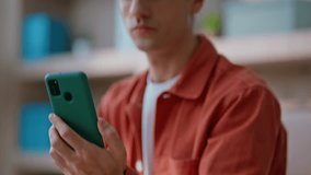 Working manager looking cellphone screen reading message with smile closeup. Busy businessman typing laptop receiving great news on phone. Happy entrepreneur reading smartphone notification in office. - Powered by Shutterstock - Get 15% off with code: PIKWIZARD15