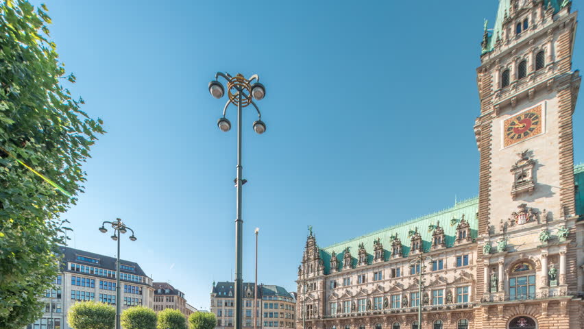 Panorama showing a building of the Hamburg City Hall timelapse, the seat of the government of Hamburg, located in the Altstadt quarter in the city center. Front view from the main square