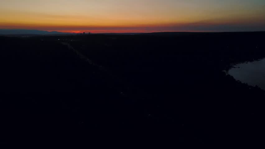 Aerial landscape of Lake Washington forest and mountains at sunset Bellevue suburb of Seattle WA USA