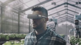 Agricultural Engineer Using Vr Headset In Modern Automated Greenhouse Robotics Future Farming Innovation Technology - Powered by Shutterstock - Get 15% off with code: PIKWIZARD15