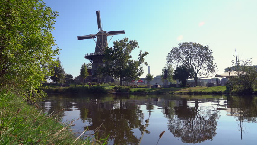 Historic Windmill De Valk Leiden Netherlands 4K UHD. The De Valk windmill and museum in Leiden, Netherlands. 4K, UHD.
