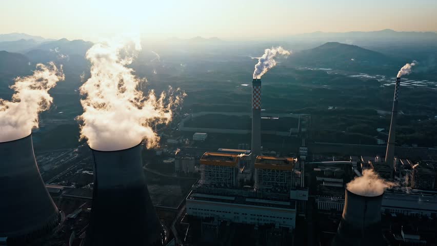 Drone approach shot of a large coal-fired thermal power plant complex in China.