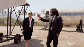 Business Executives Walking Near Old Plane, Two Professionals Discussion at Airfield, Corporate managers talking with each other, Engineers examining abandoned airplane, In formal attire, Male female - Powered by Shutterstock - Get 15% off with code: PIKWIZARD15