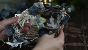 Female hands holding rustic Christmas wreath to decorate home for Christmas.  - Powered by Shutterstock - Get 15% off with code: PIKWIZARD15