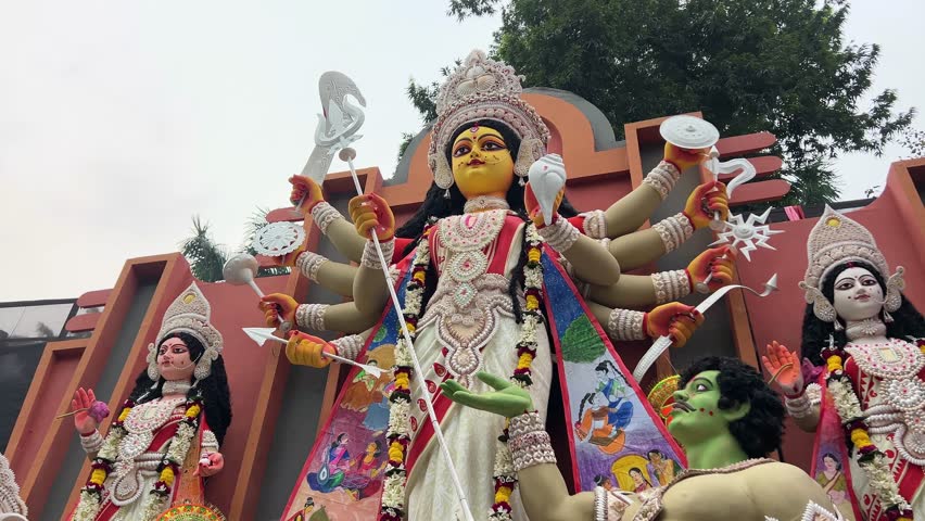 Low angle shot of Goddess Durga Maa of a pandal ready to go to carnival in Kolkata, India.