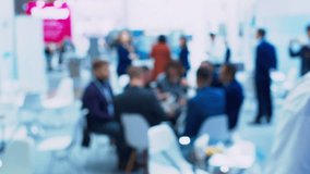 Unrecognizable people who are holding a business meeting or negotiation. Blurry defocused video. Business theme background. - Powered by Shutterstock - Get 15% off with code: PIKWIZARD15