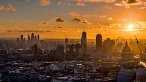 Sunset to night time lapse view of the skyline of central London from Elephant and Castle in the background along the river Thames until Westminster - Powered by Shutterstock - Get 15% off with code: PIKWIZARD15