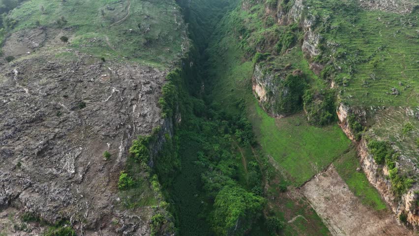 Aerial Shot Of Rock Mountain And Serene Valley