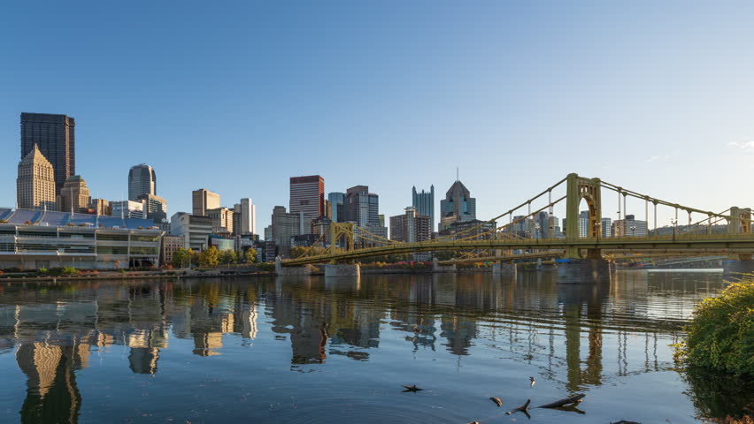 Pittsburgh, Pennsylvania, USA downtown cityscape time lapse from day to night.
