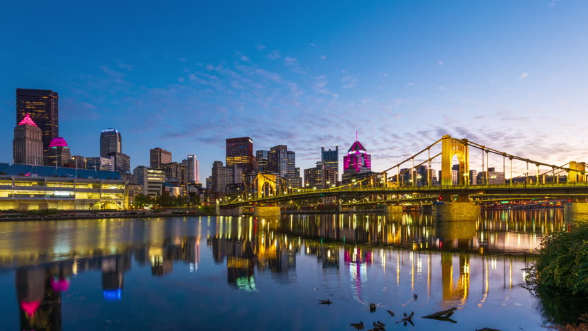 Pittsburgh, Pennsylvania, USA downtown cityscape time lapse from day to night.