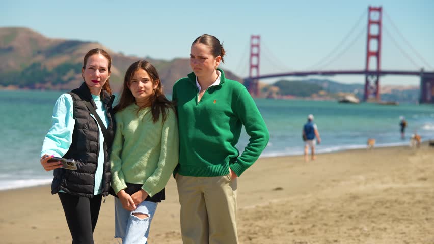 Family taking a selfie on a San Francisco Beach
