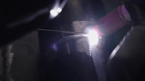Close-up view of Gas Tungsten Arc Welding highlights skilled technique and precision. The bright arc illuminates detailed metalwork against a contrasting dark backdrop, showcasing expertise - Powered by Shutterstock - Get 15% off with code: PIKWIZARD15