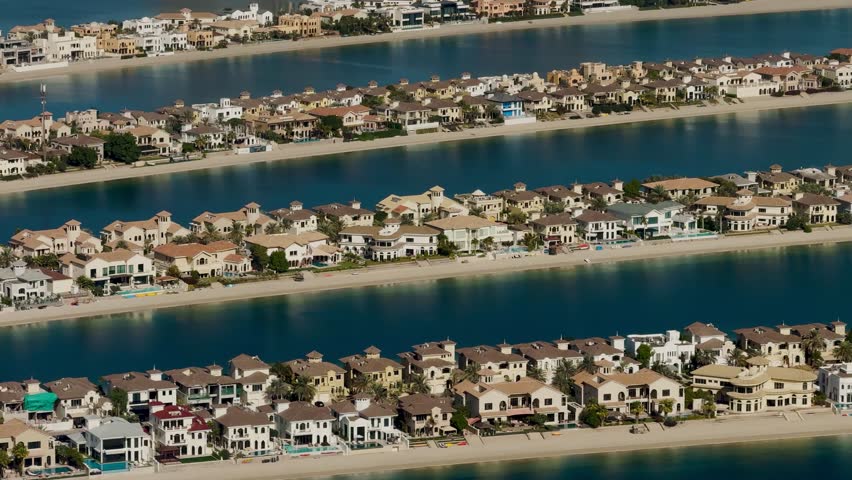 The Palm Jumeirah in Dubai is an artificial island in the shape of a palm tree, famous for its luxury resorts, villas and apartments. It is one of modern wonders, a symbol of engineering and opulence.