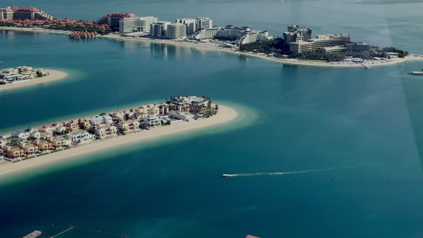 The Palm Jumeirah in Dubai is an artificial island in the shape of a palm tree, famous for its luxury resorts, villas and apartments. It is one of modern wonders, a symbol of engineering and opulence.