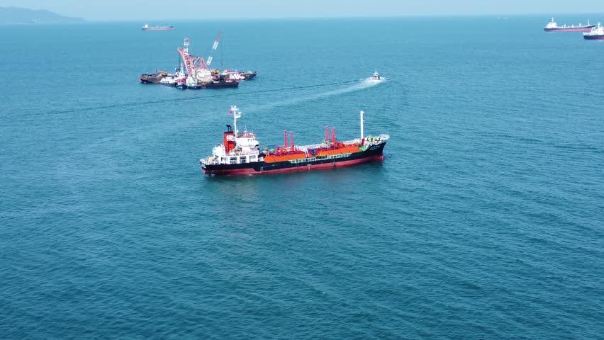 Oil and LPG Tankers Anchored in Bay in 4K Drone Footage, Showcasing Maritime Supply Chain Operations and Global Transport Logistics