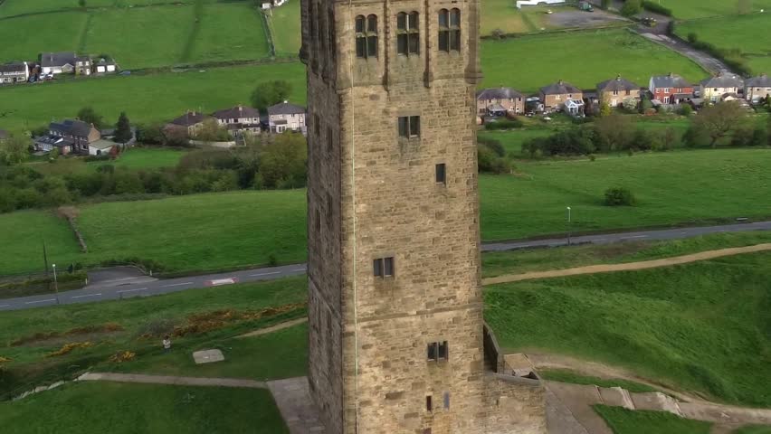 Ariel pull away shot of Victorian Tower at Almondbury village in Yorkshire.